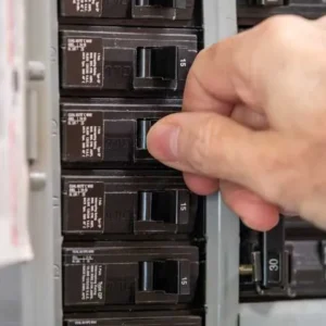 Electrician in Texas working on an electrical panel